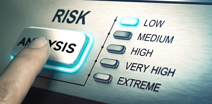 man finger about to press an analysis push button. Focus on the blue led. Concept image for illustration of risk management or assessment.